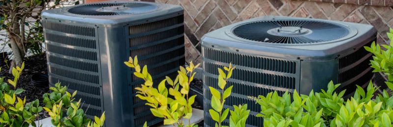 HVAC technician performing AC repair service in Bonita CA home